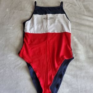 Body suit. Size small. Color blue, red, and white